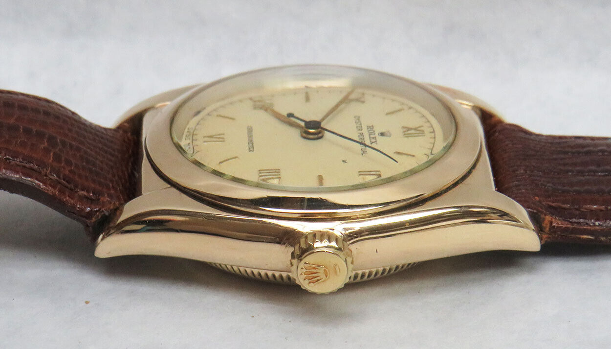Rolex watch, bubble back, 14K yellow gold, original dial with Arabic numerals, 1940s