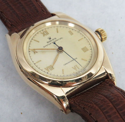 Rolex watch, bubble back, 14K yellow gold, original dial with Arabic numerals, 1940s
